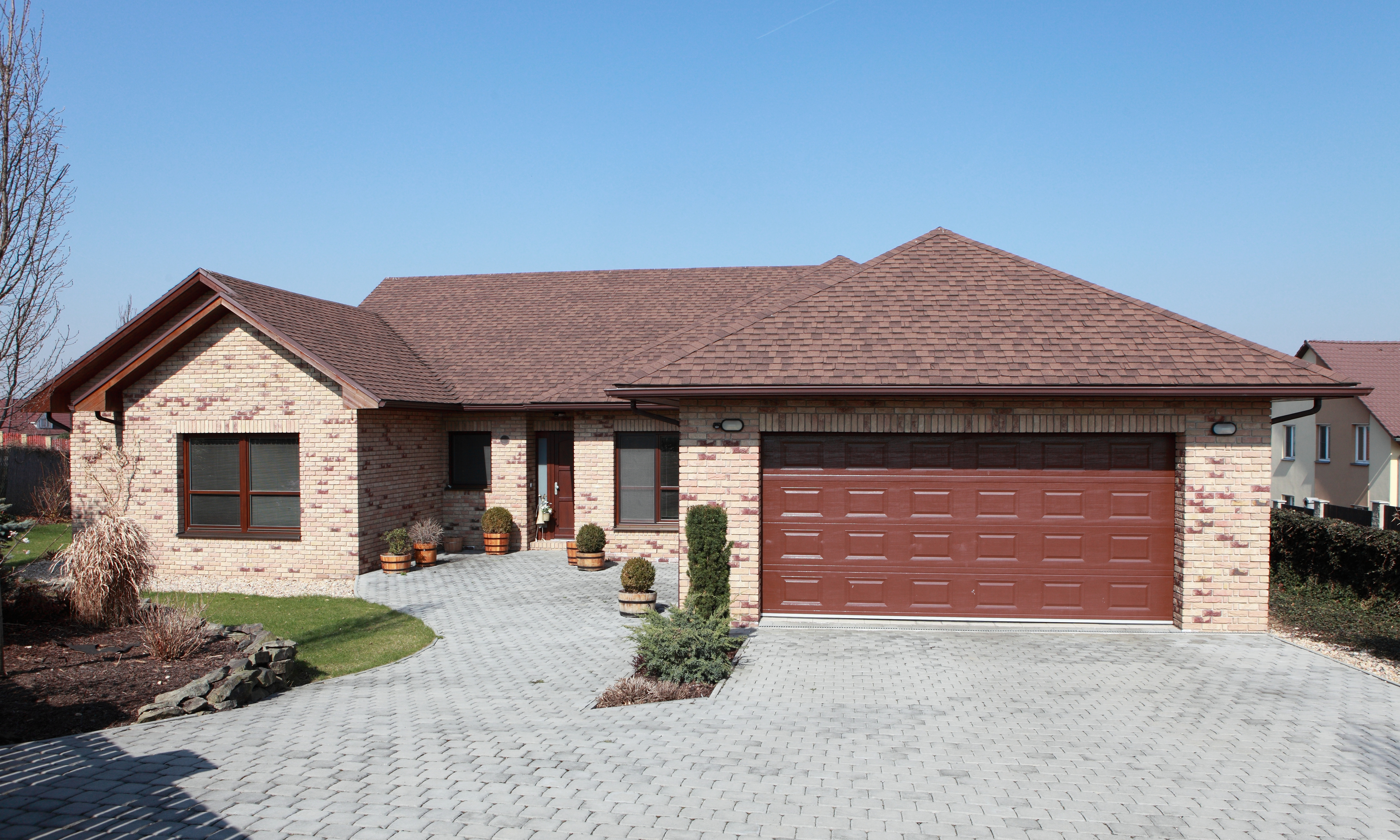 Finished garage door installation showing beautiful new residential garage door completed by professional installers